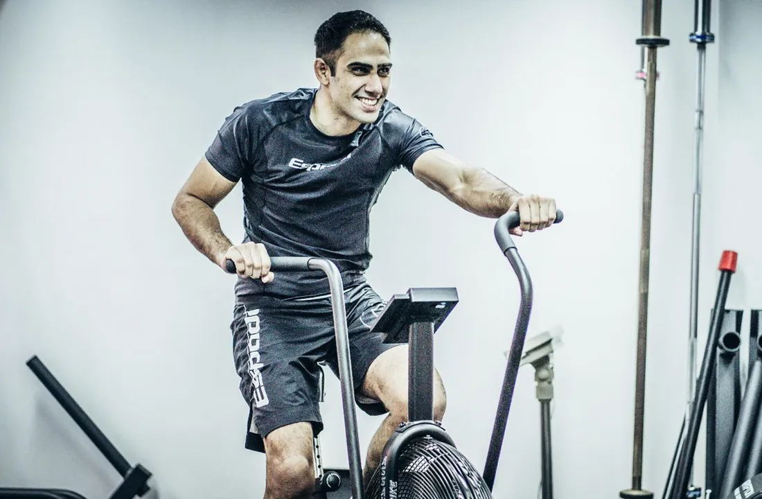 Athlete on an air bike during HIIT